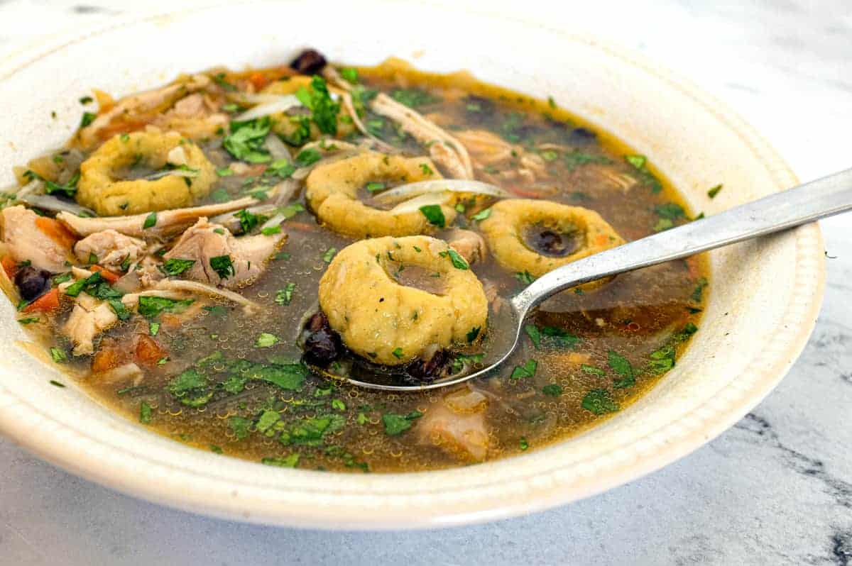 A bowl of Mexican soup with chochoyotes