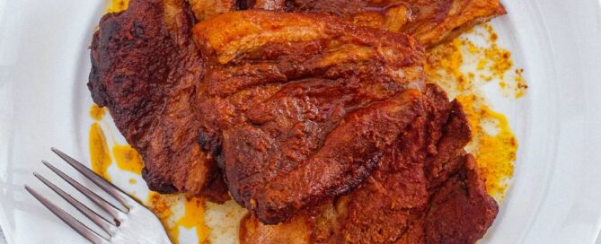 Italian pork (Pampanella Molisana) on platter with a fork