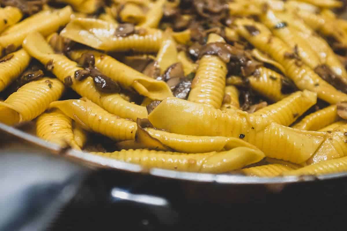 Garganelli Pasta with Mushroom Ragu in a large pan