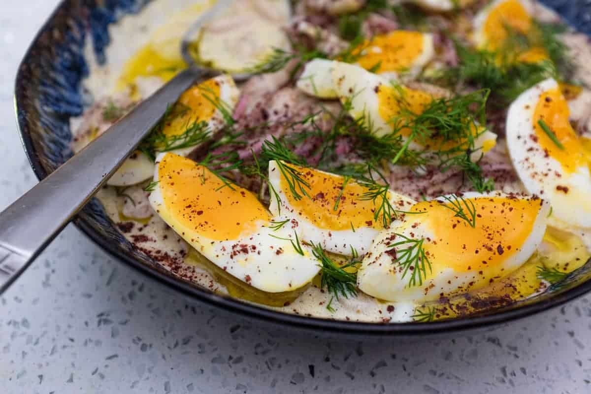 A Turkish bean salad with eggs, onion and dill - Fasulye Piyaz