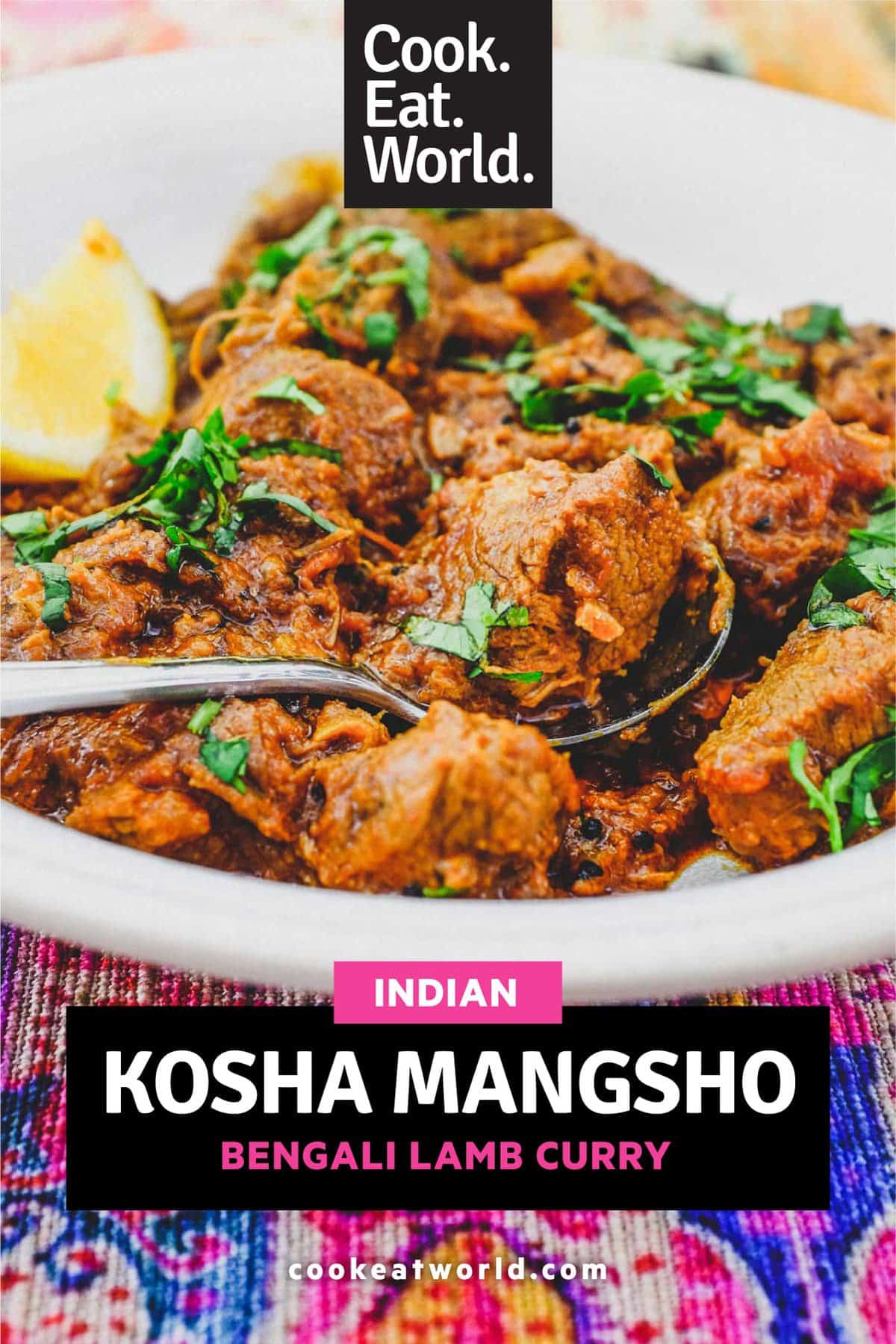 A bowl of Kosha Mangsho Curry (Bengali Lamb Curry) with a spoon.