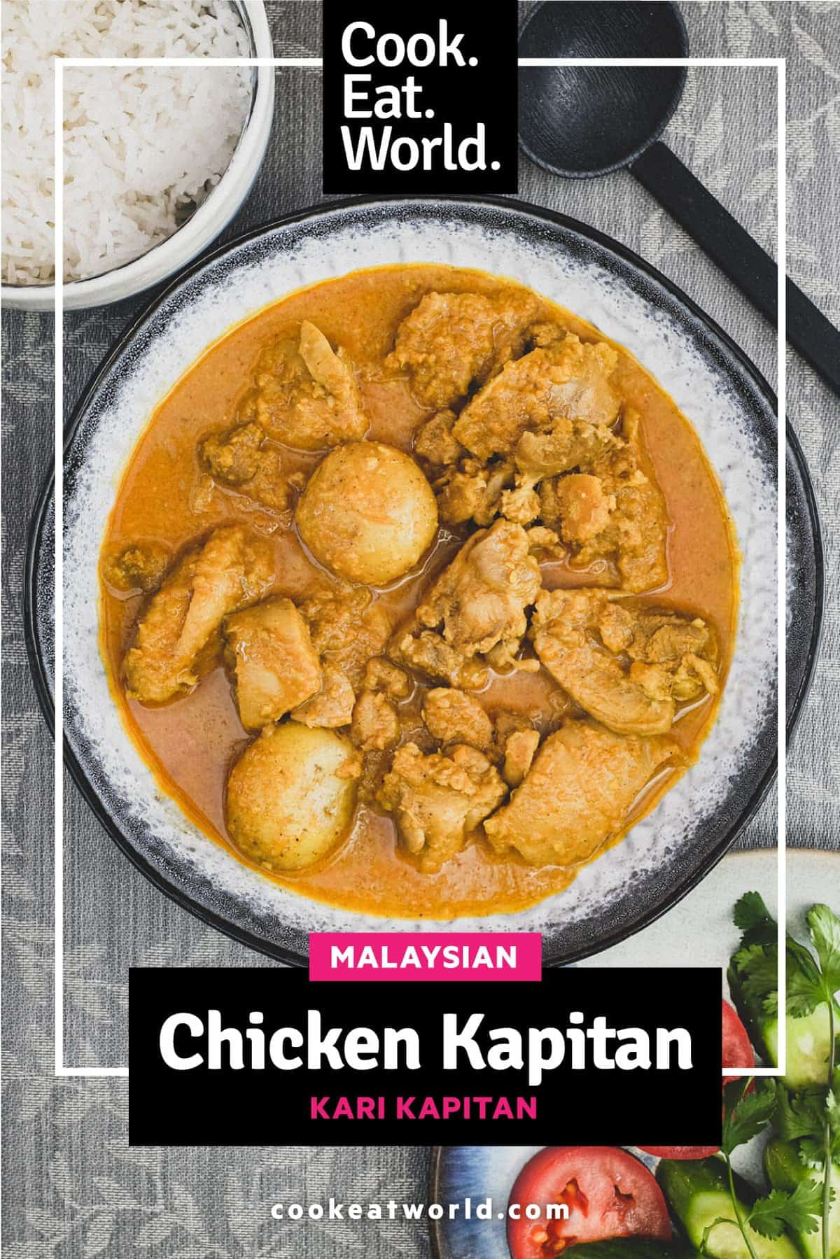A bowl of Malaysian Chicken Kapitan Curry (Kari Kapitan) with rice and salad.