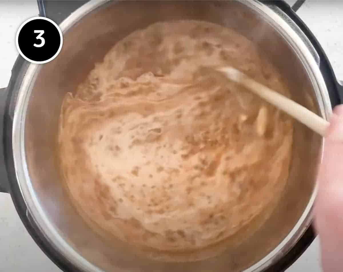 Instant Pot Dal Makhani | cookeatworld.com Adding cream to the Instant Pot Dal Makhani