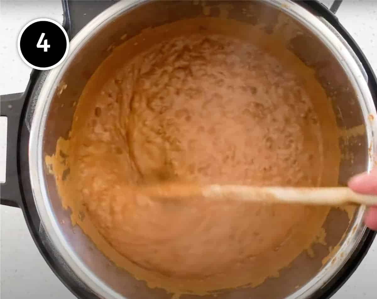 Instant Pot Dal Makhani | cookeatworld.com Stirring the creamyI nstant Pot Dal Makhani