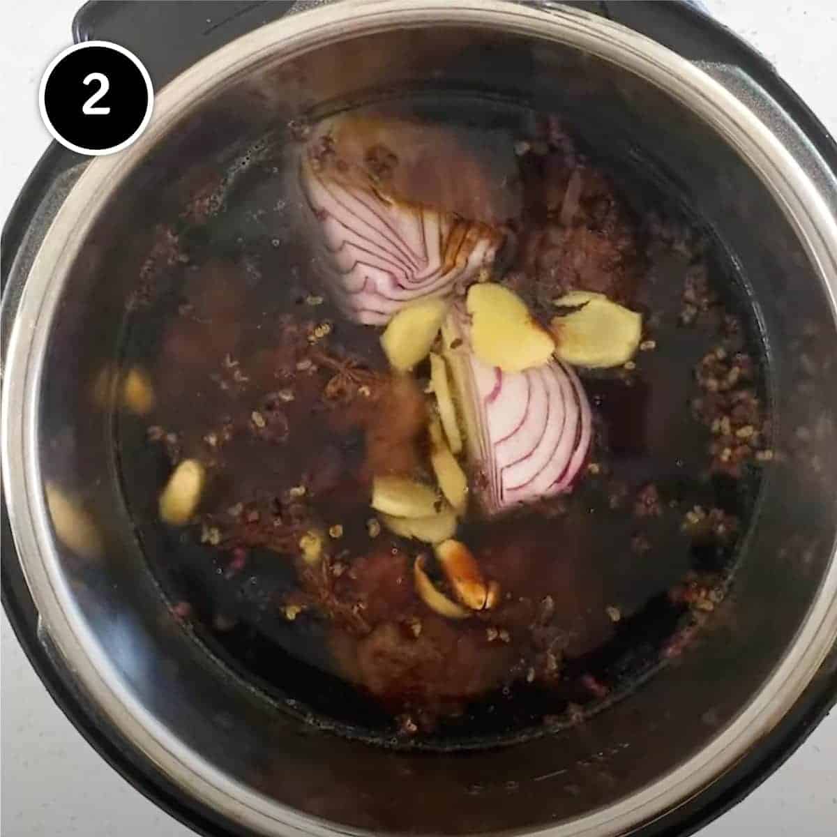 Adding all the soup ingredients to an Instant pot for Chinese Oxtail Soup