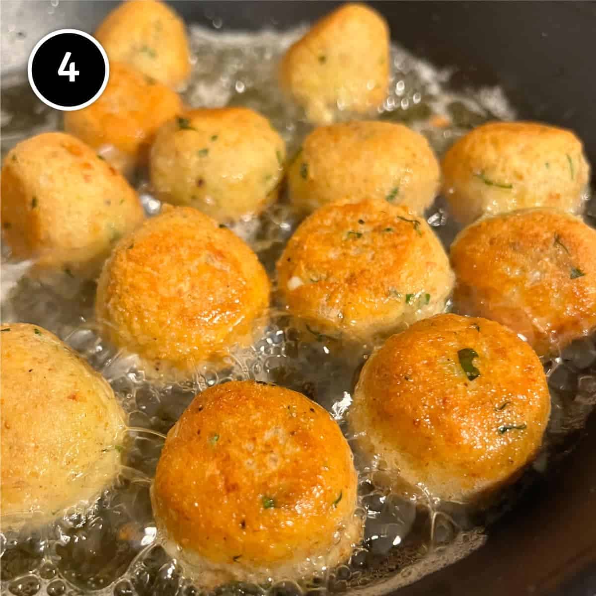 Shallow frying the bread. cheese & egg balls for Pallotte Cacio e Uova (Cheese & Bread Balls)