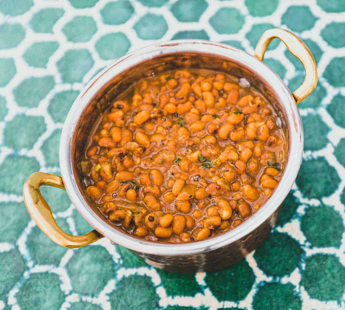 Red Moong Dal Curry | cookeatworld.com Red Moong Dal Curry in a copper pan