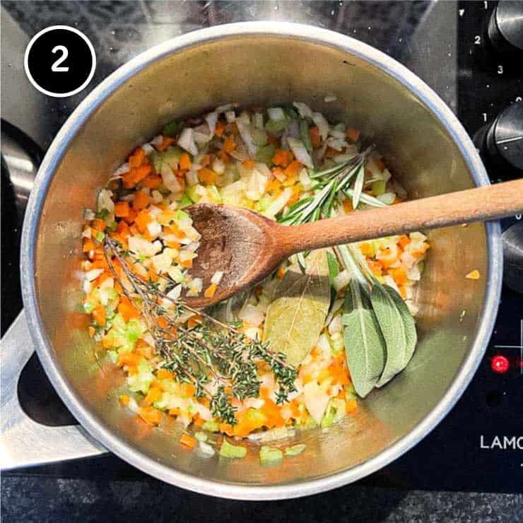 sautéing onion, carrot, celery and herbs for Salt Pork with Puy Lentils (Petit Sale aux Lentilles)