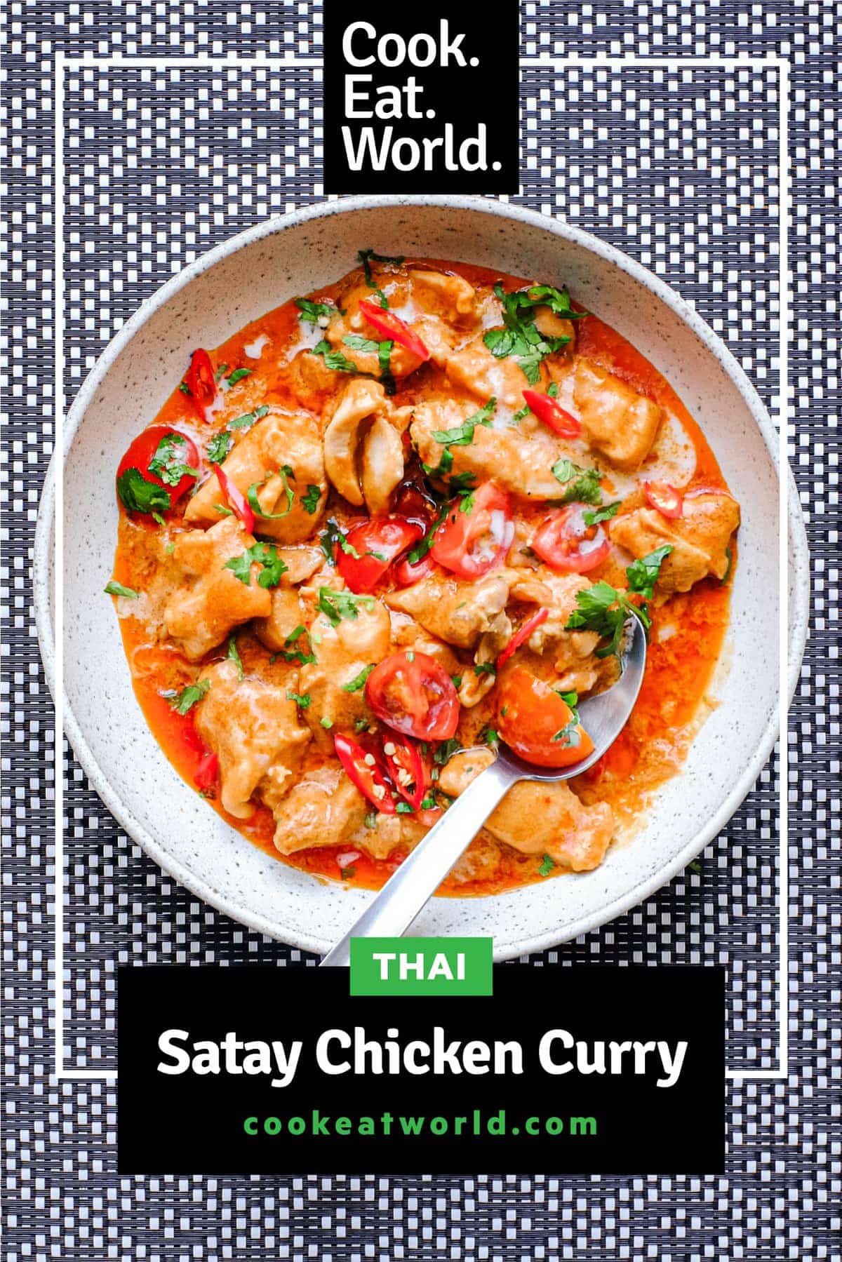 A vibrant peanut satay chicken curry with red chillies and cilantro