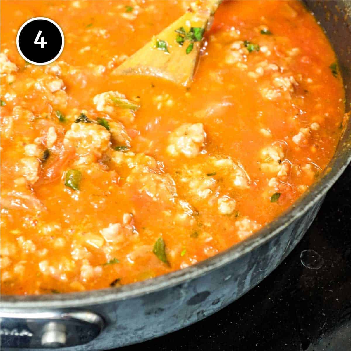 Simmering Pasta with Sausage Ragu