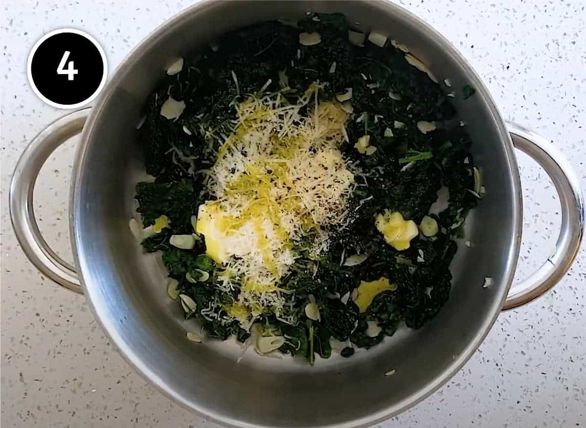 Adding butter, cheese and olive oil to the cabbage for Pasta with Cavolo Nero & Almonds