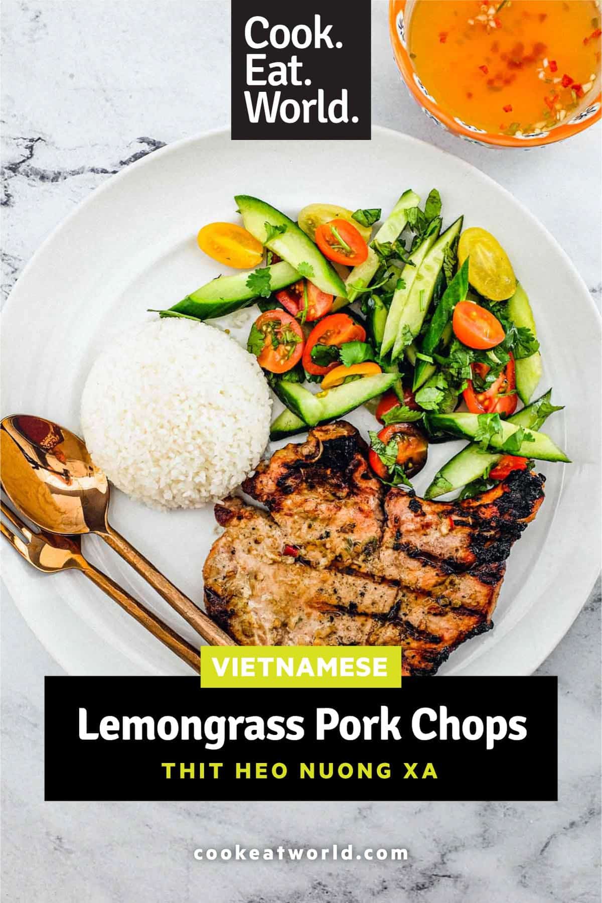 Pork chops marinated in lemongrass and other aromatic Vietnamese ingredients. Served with a simple salad of cucumber, tomato and herbs. A Nước chấm dipping sauce accompanies.