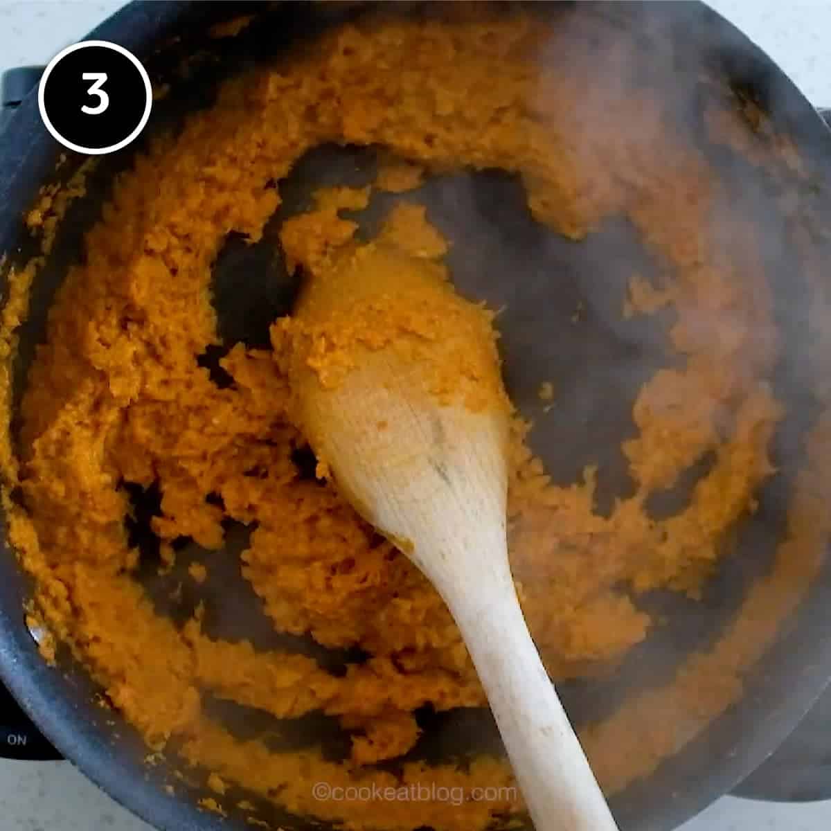 Frying a spice paste for a Burmese chicken curry