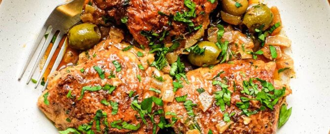 A bowl of Spanish Chicken with olives