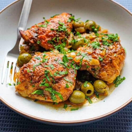 A bowl of Spanish Chicken with olives