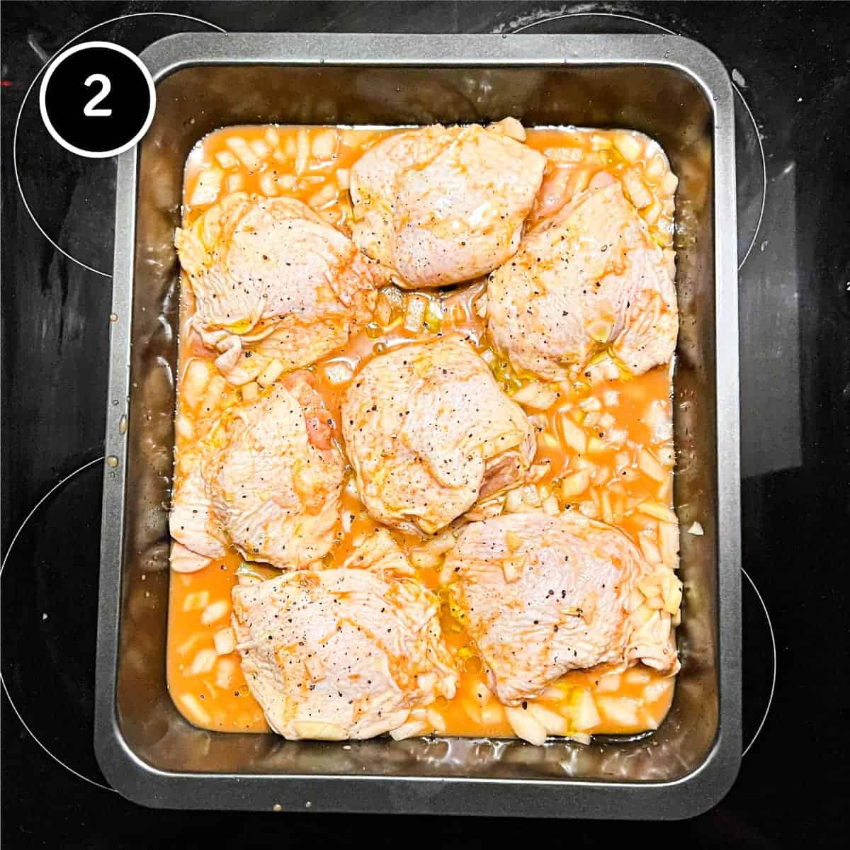 Spanish Chicken in a baking tin before cooking
