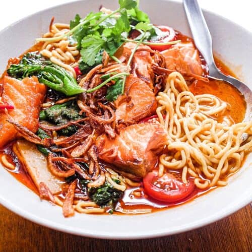 A bowl of Thai Curry Noodle Soup with Salmon
