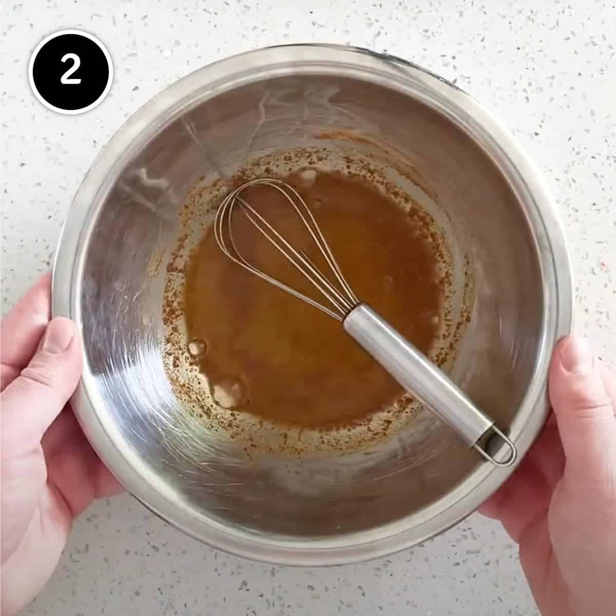 Mixing spices with water to make a paste