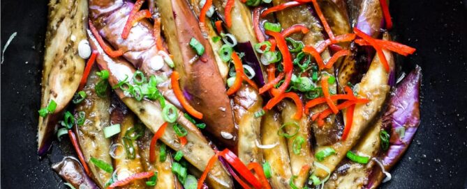 A wok of creamy stir-fried Chinese Eggplant
