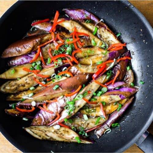 A wok of creamy stir-fried Chinese Eggplant