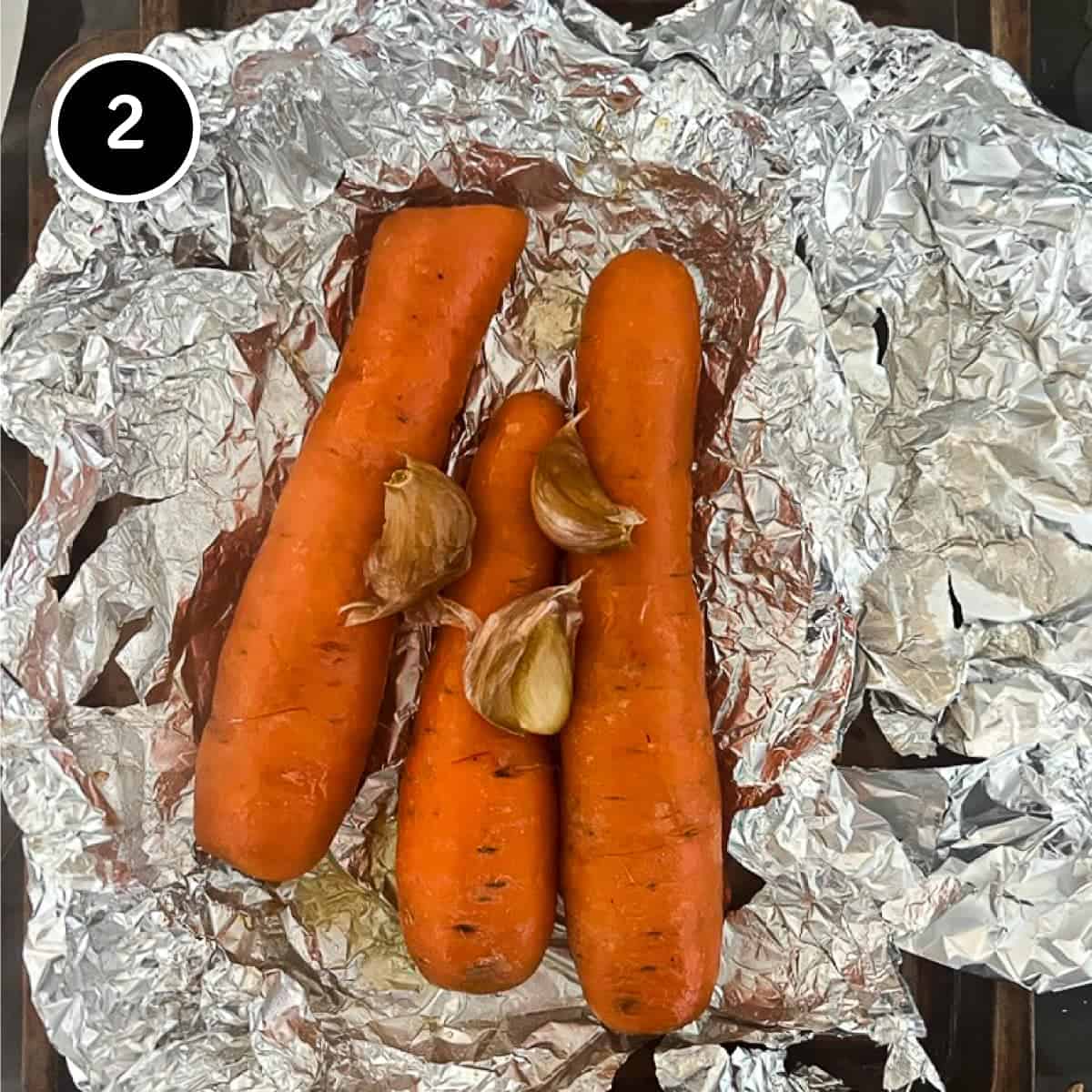 Roasted carrots and garlic in foil