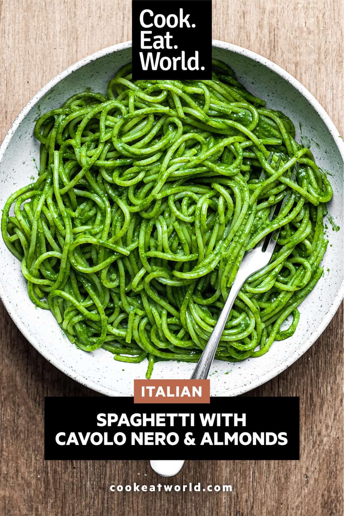 A bowl of spaghetti in a green puree of cavolo nero cabbage