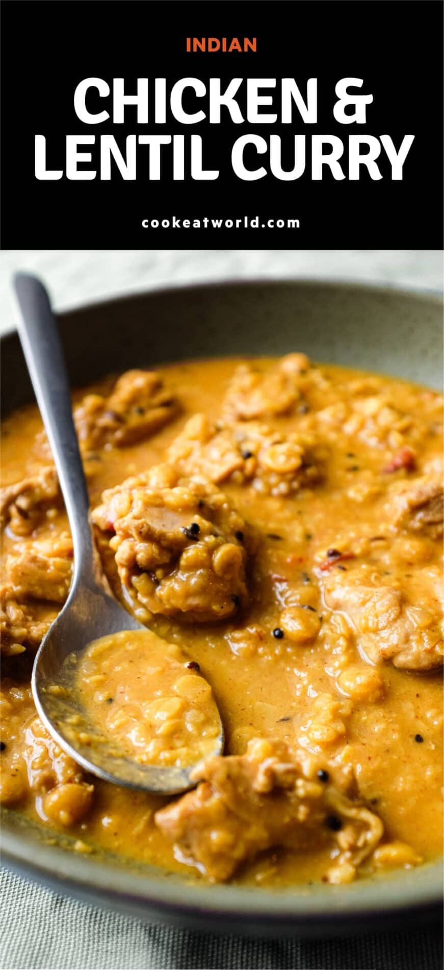 A bowl of lentil curry with a spoon