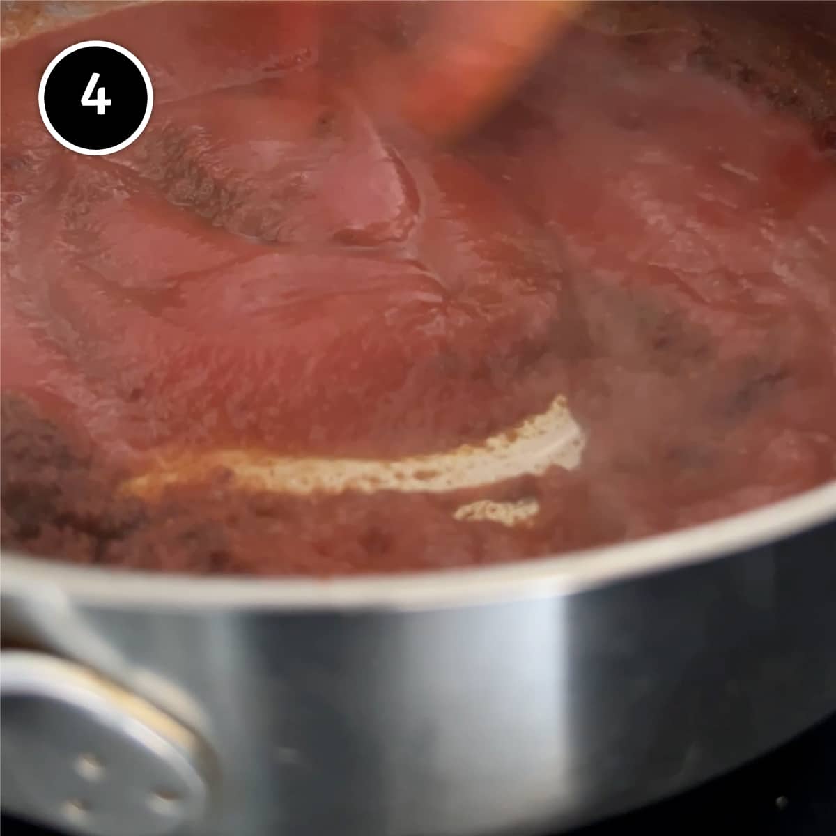 Simmering the Chraime tomato sauce