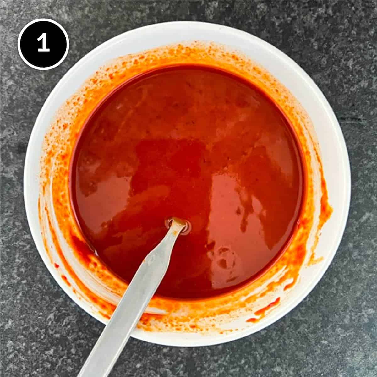 Gochujang sauce in a small white bowl