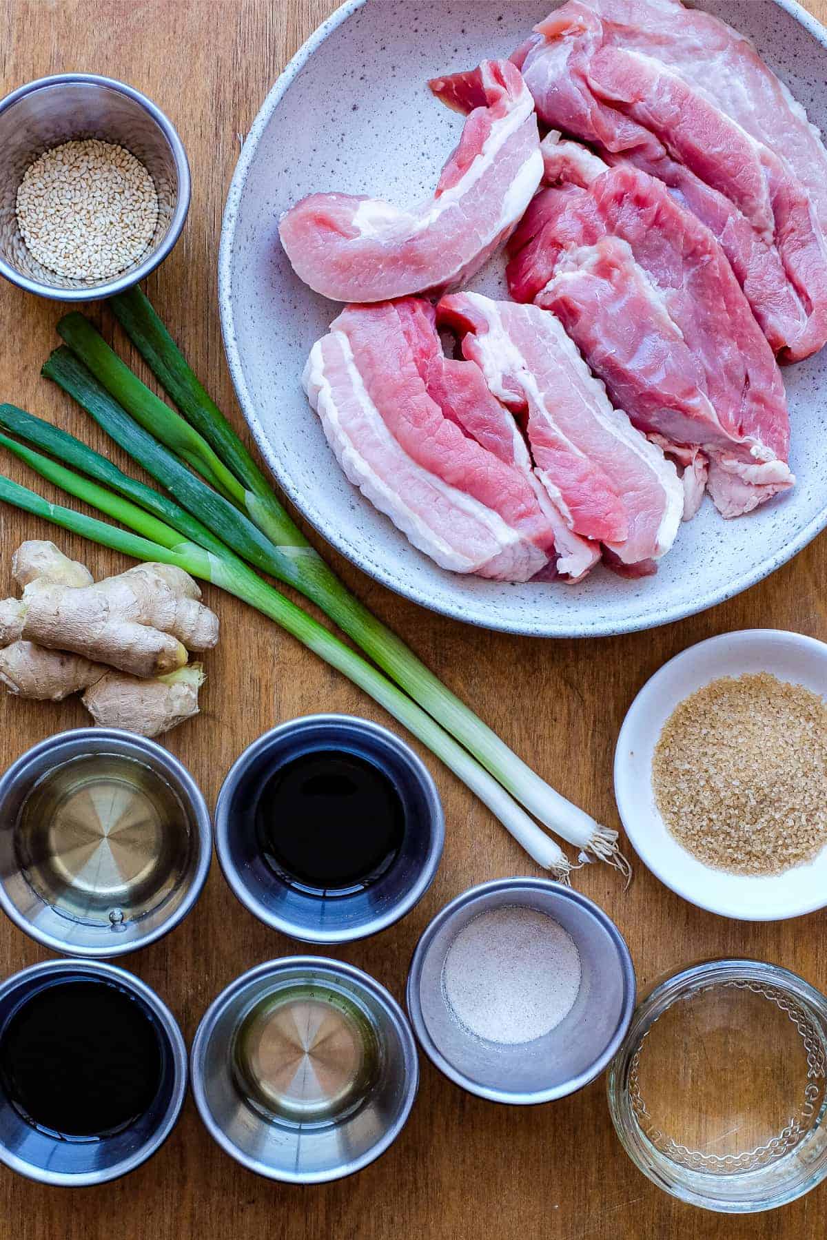 The ingredients for Buta Kakuni including pork, dashi, soy sauce, sugar, mirin, sake, ginger and spring onion