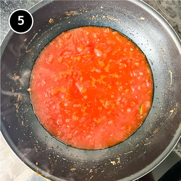 Tomato sauce cooking in a pan