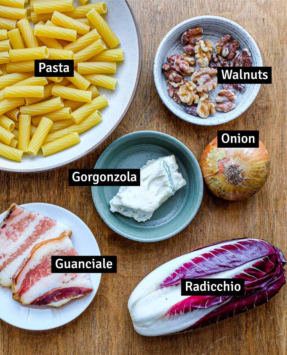 All the ingredients for Pasta with guanciale, radicchio, gorgonzola ad walnuts.