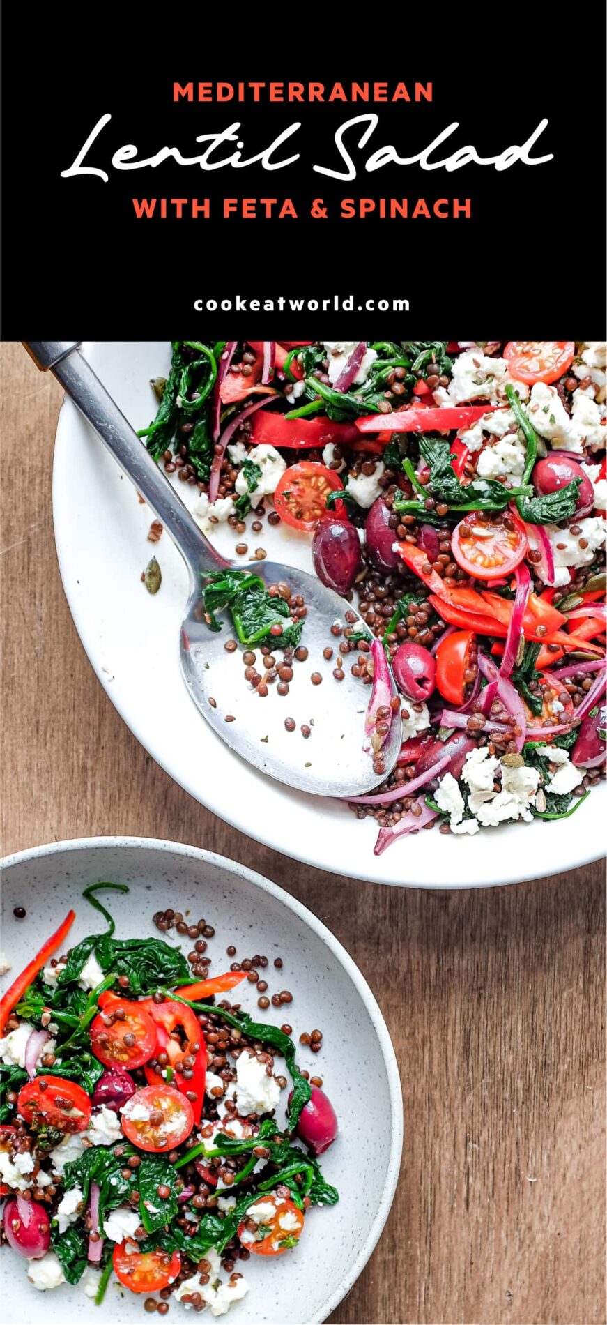 A bowl of Greek lentil salad featuring tomatoes, spinach, lentils, feta and red onion
