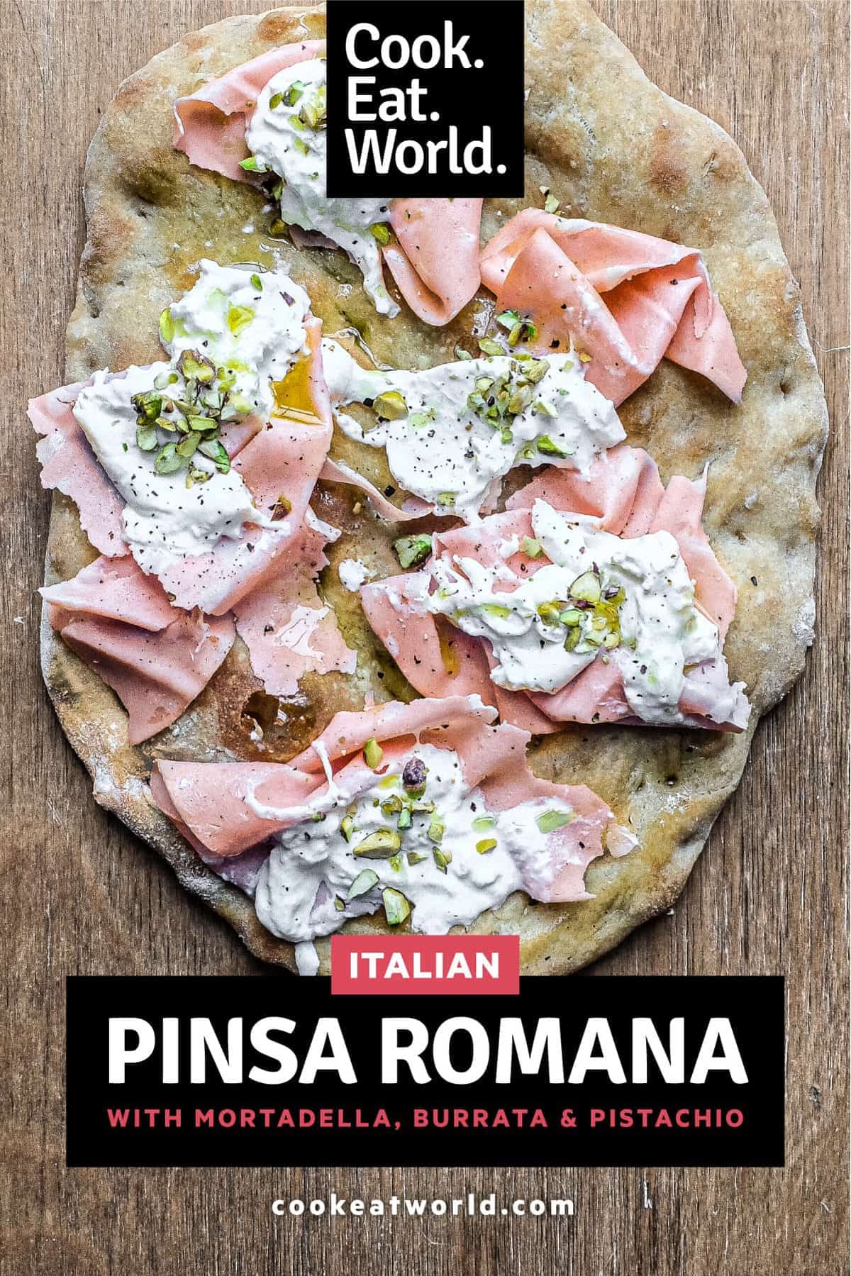 A pinsa with Mortadella, burrata and chopped pistachio.