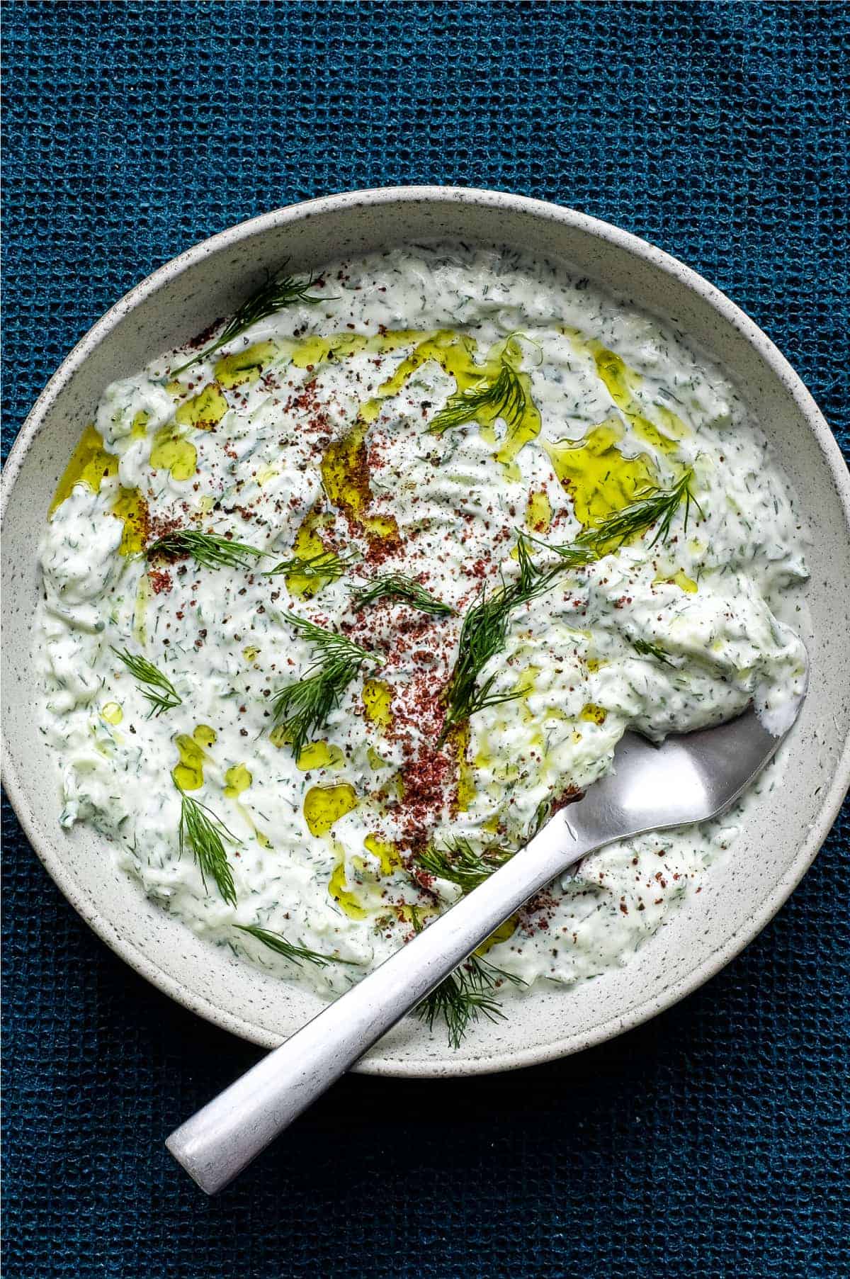A bowl of Turkish Cacik - a yoghurt and cucumber meze or condiment