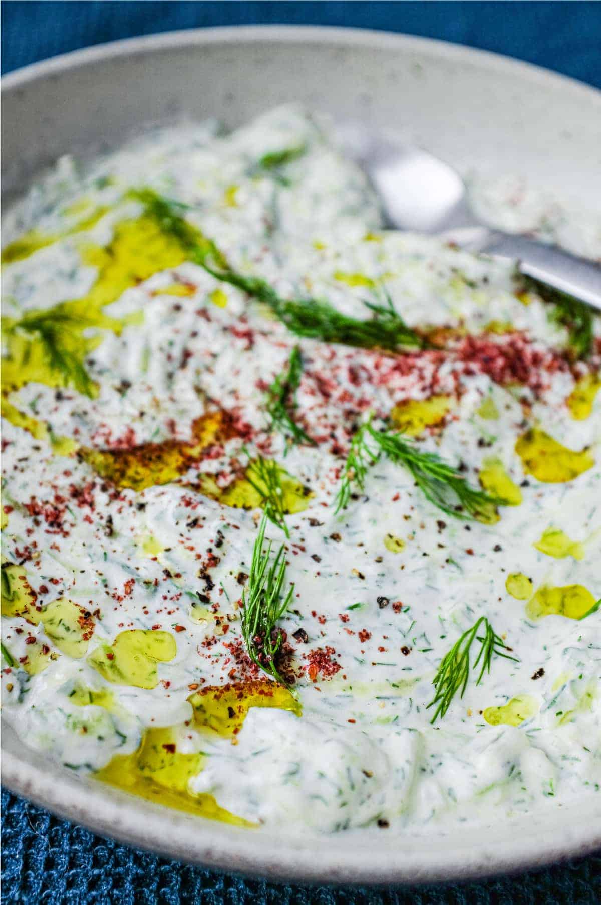 A bowl of Turkish Cacik - a yoghurt and cucumber meze or condiment