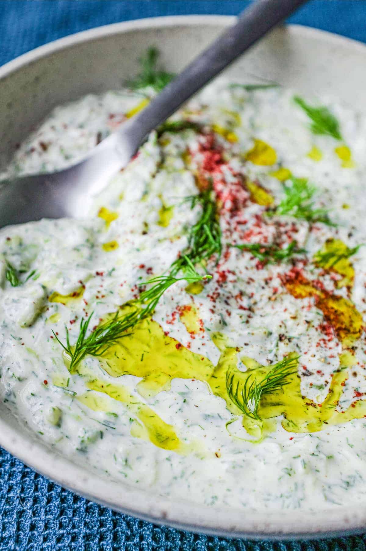 A bowl of Turkish Cacik - a yoghurt and cucumber meze or condiment