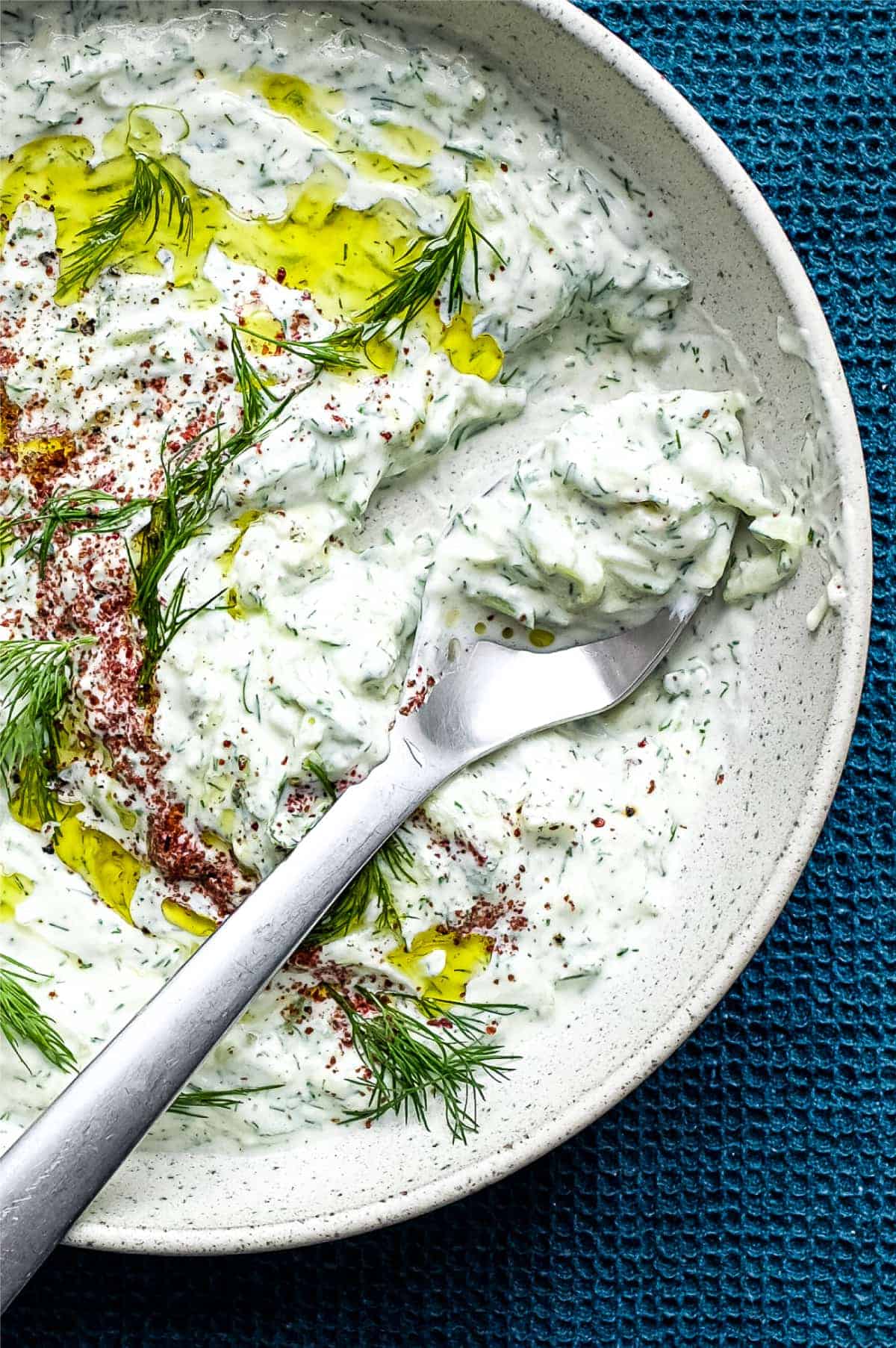 A bowl of Turkish Cacik - a yoghurt and cucumber meze or condiment