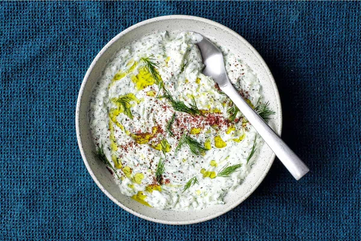 A bowl of Turkish Cacik - a yoghurt and cucumber meze or condiment