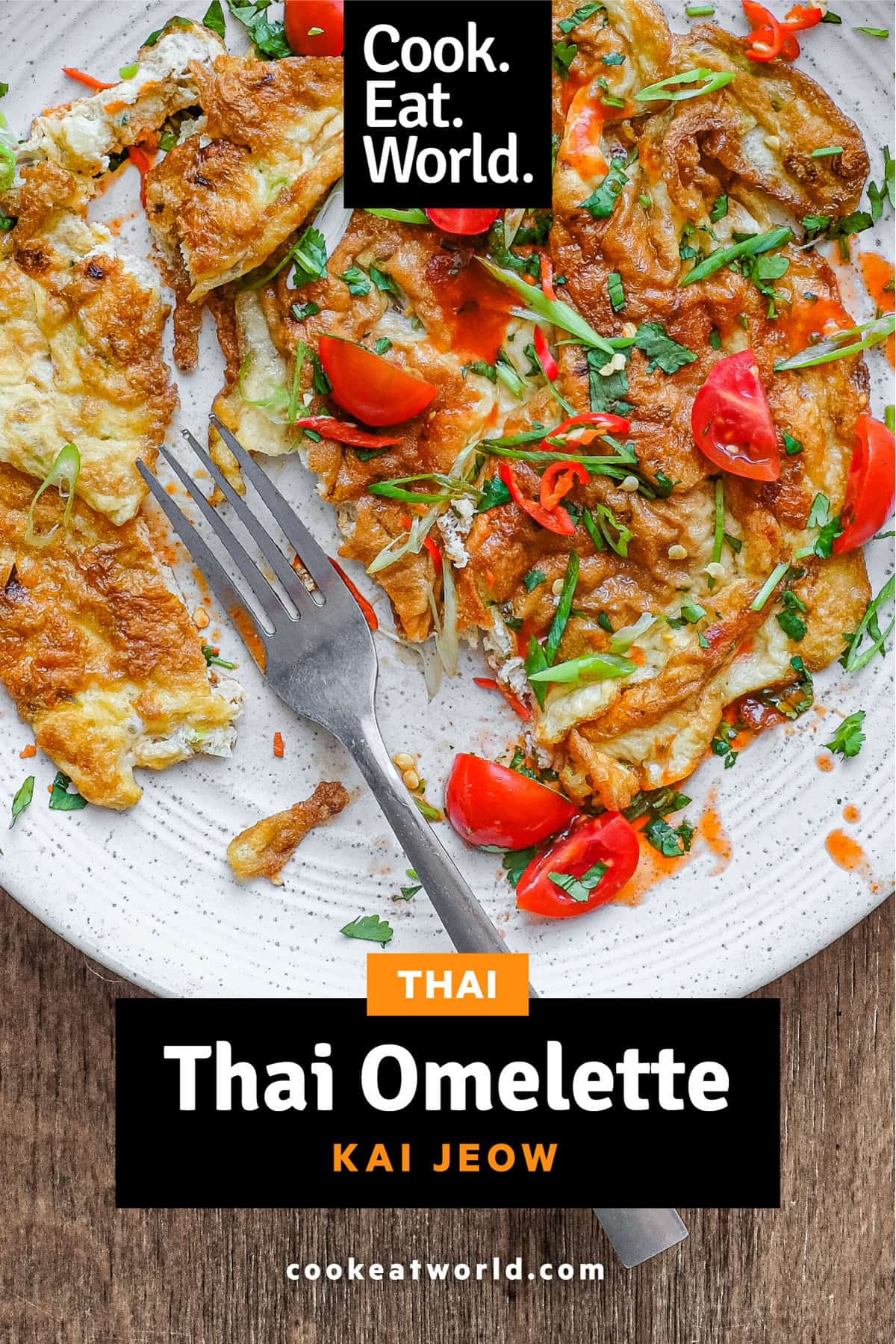 A plate of Thai Omelette with a fork.
