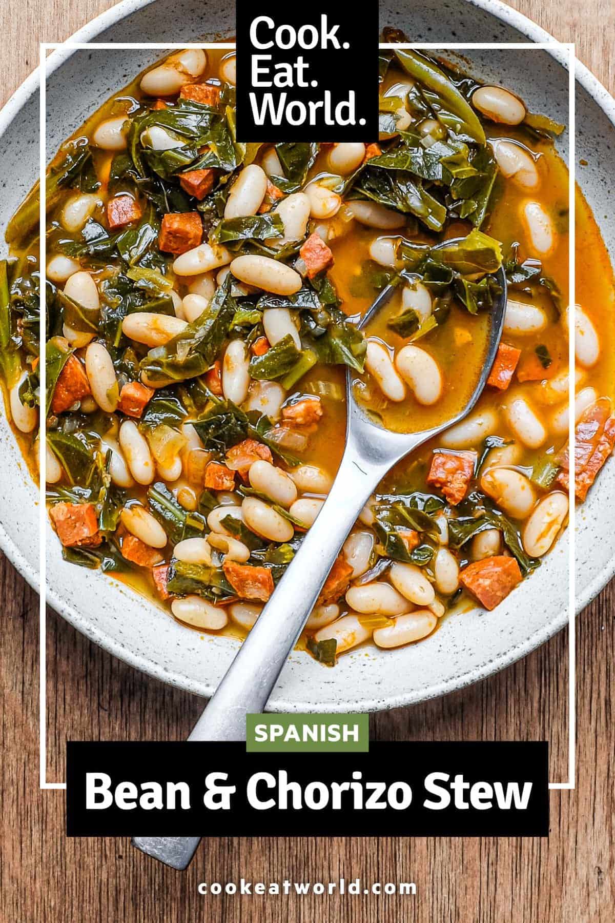 A bowl of Spanish Bean and Chorizo stew with a spoon