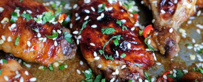 A baking sheet with Sticky Baked Chinese Chicken Wings