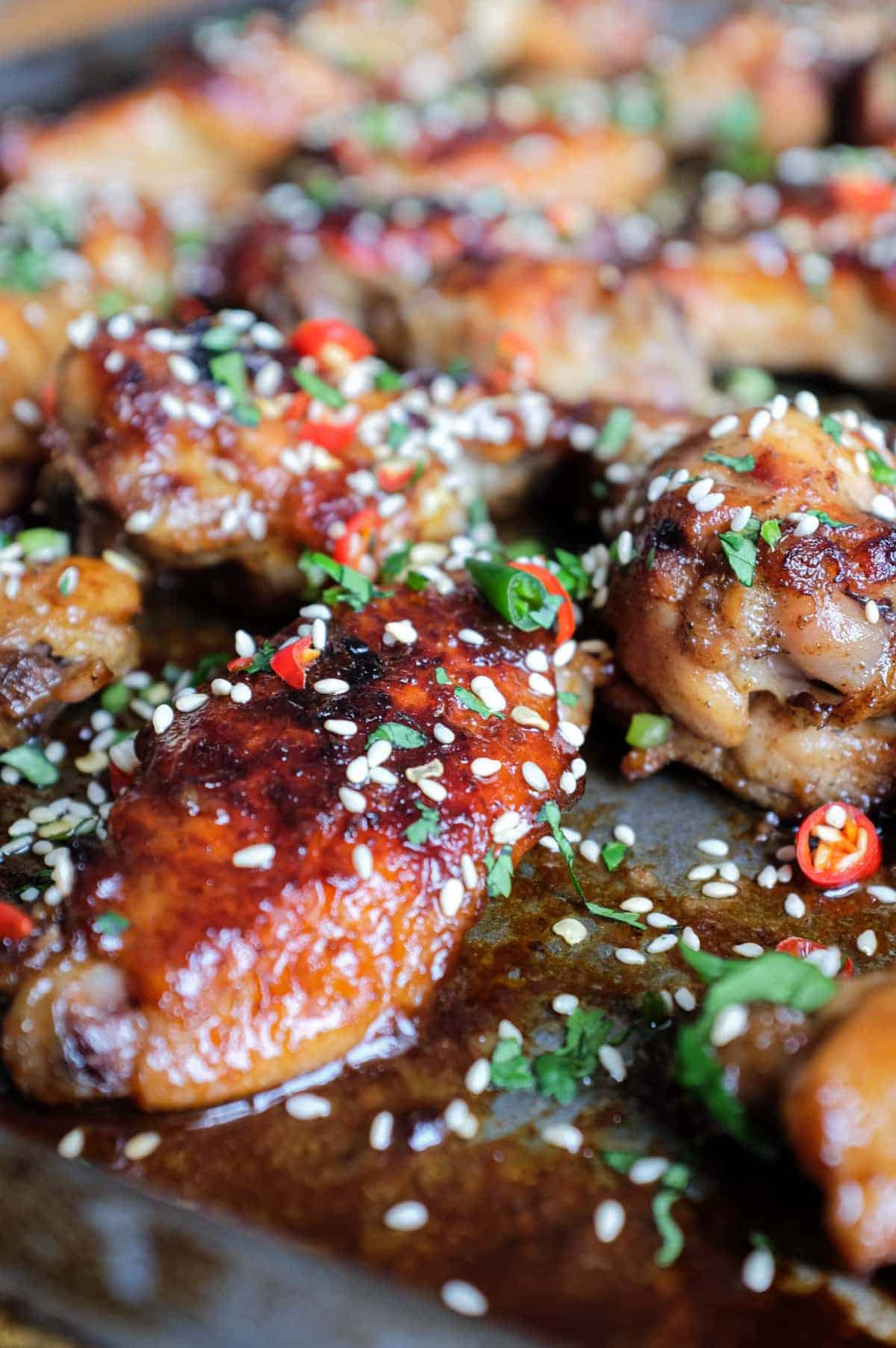 A baking sheet with Sticky Baked Chinese Chicken Wings