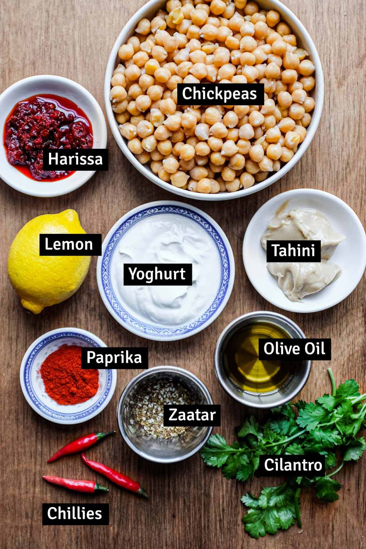 The ingredients for Harissa Hummus arranged on a table.