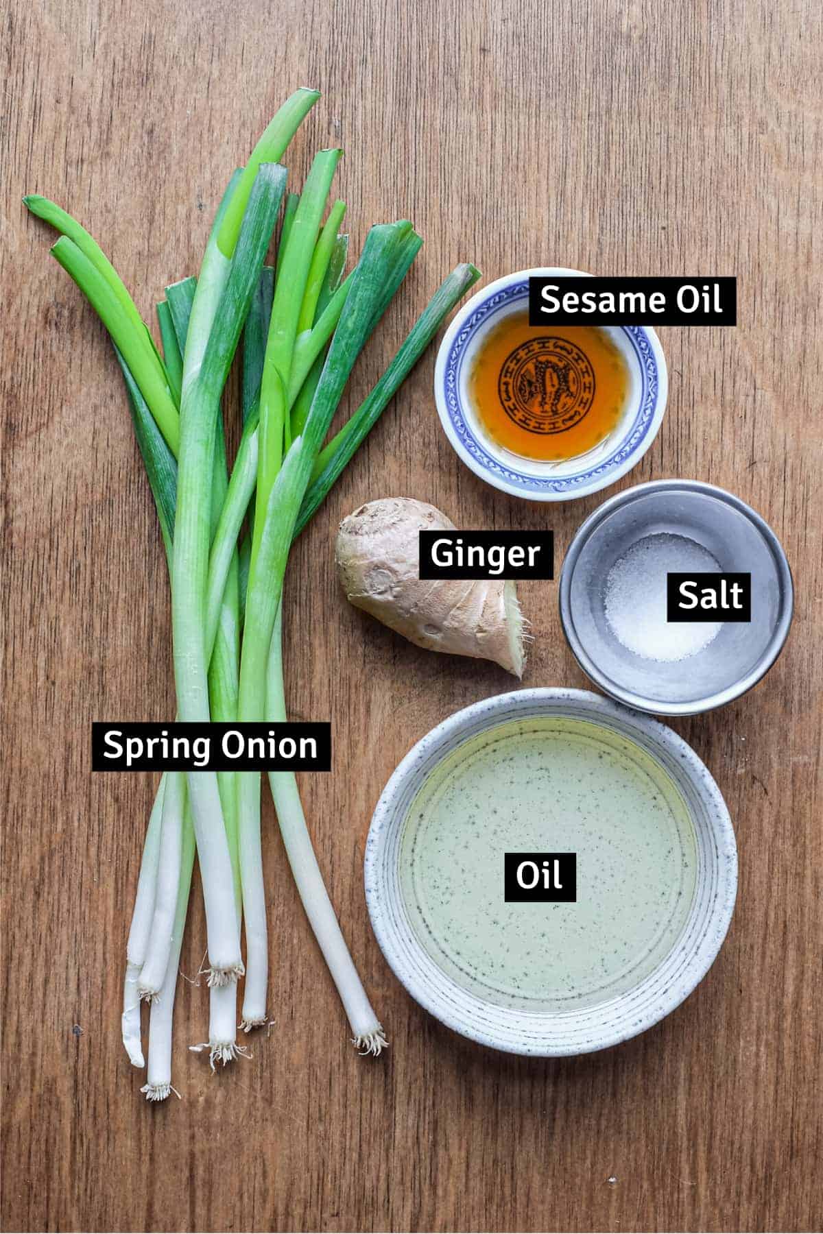 The five ingredients for Chinse Ginger Scallion Sauce: Scallions, ginger, sesame oil, peanut oil and salt.