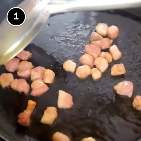 Kimchi Fried Rice | cookeatworld.com Bacon frying in a pan