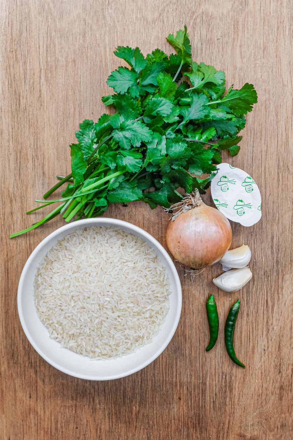 The ingredients for Mexican Cilantro Rice - rice, cilantro, onion, garlic, chilli and vegetable stock.