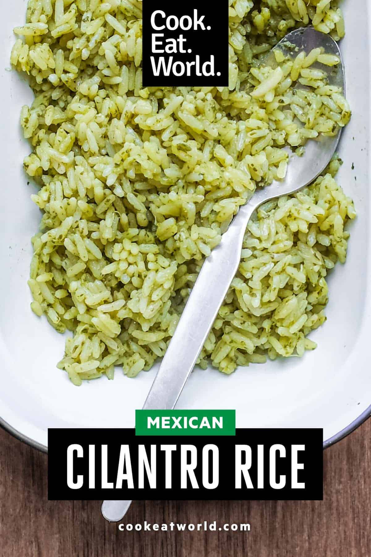 A bowl of Mexican Cilantro Rice (Green Rice) with a spoon.