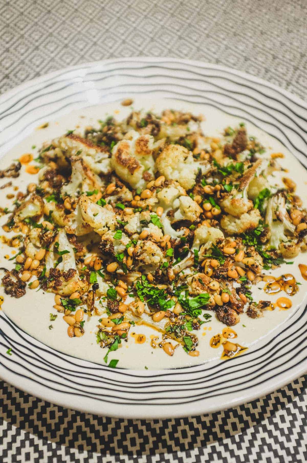 A platter of Hummus with cauliflower