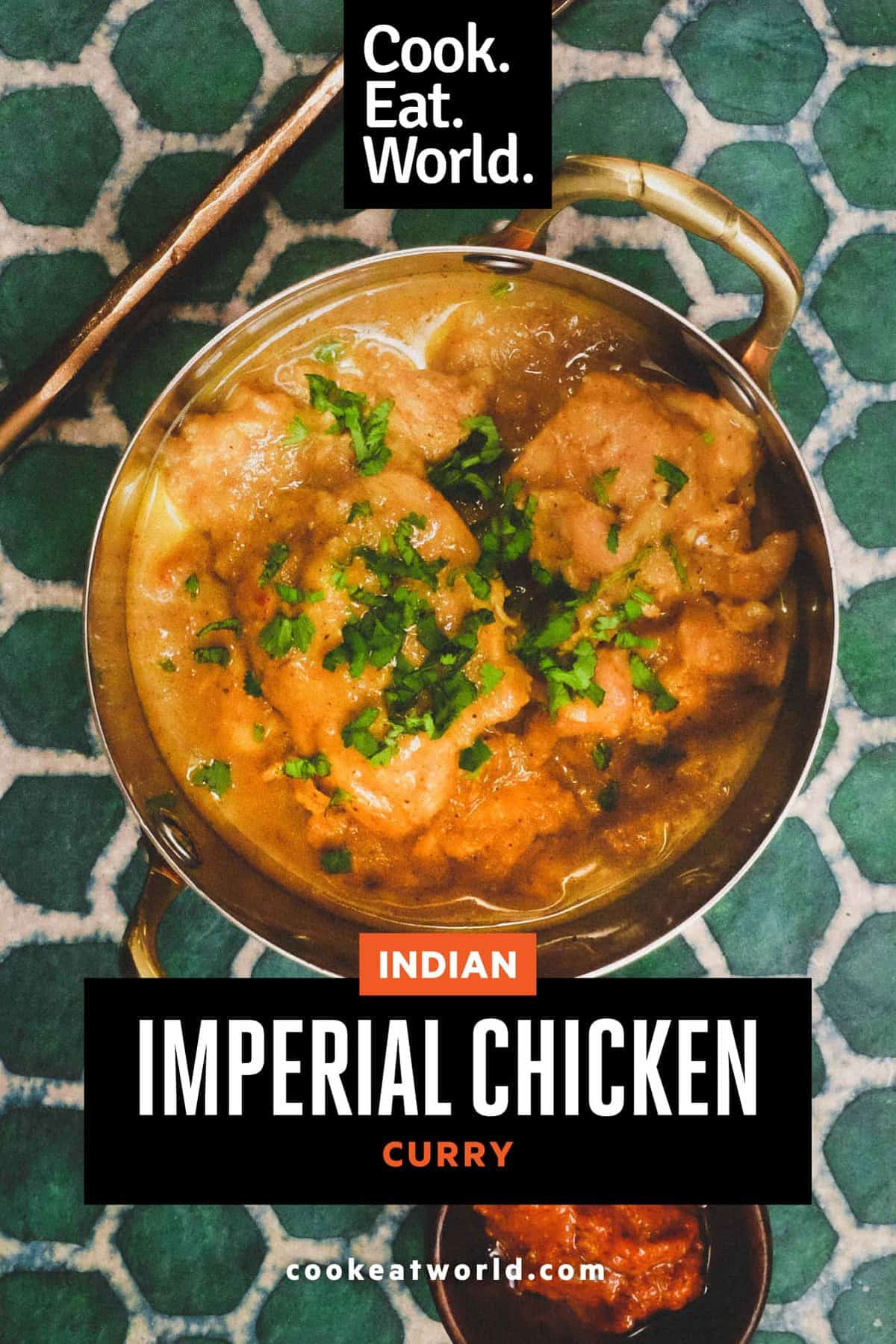 A small bowl of Imperial chicken curry with chutney on the side.